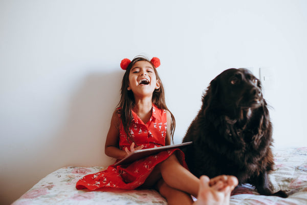 dog with a small girl